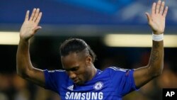 Didier Drogba célèbre son but lors du match en Ligue des Champions dans le Groupe G entre Chelsea et NK Maribor au stade Stamford Bridge à Londres le mardi 21 octobre 2014. (AP Photo / Kirsty Wigglesworth )