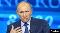 FILE - Russian President Vladimir Putin, April 25, 2013 