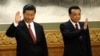 习近平(左)和李克强(右)11月15日在中共政治局七常委与媒体会面时亮相
