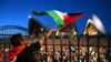 Participants of a pro-Palestinian rally react outside the Sydney Opera House in Sydney, Oct. 9, 2023