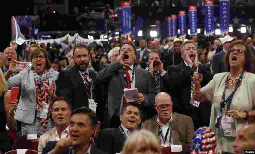 Republican National Convention delegates yell and scream as the Republican National Committee Rules Committee announces that it will not hold a recorded vote on the Rules Committee's Report and rejects the efforts of anti-Trump forces to hold a roll-call vote, at the Republican National Convention in Cleveland, Ohio, USA, July 18, 2016.