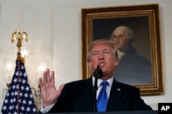 President Donald Trump makes a statement on Iran policy in the Diplomatic Reception Room of the White House, in Washington, Oct. 13, 2017.