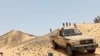 Para kombatan dari kelompok aliansi pemberontak Tuareg yang baku tembak dengan tentara bayaran Rusia, Wagner, tampak di timur laut Mali, dekat Mali, Juli 2024. (Foto: Coordination of Azawad Movements via Reuters)
