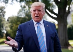 FILE - President Donald Trump speaks to the media before leaving the White House in Washington, Aug. 2, 2019.