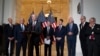 Republican Senator Rob Portman, center, standing with with other senators, speaks during a news conference on Capitol Hill in Washington, Jan. 19, 2022.