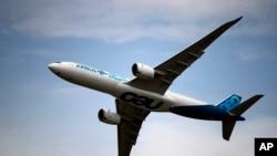 An Airbus A350 performs a demonstration flight at Paris Air Show, in Le Bourget, northeast of Paris, June 18, 2019.