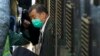 FILE - Democracy advocate Jimmy Lai arrives at Hong Kong's Court of Final Appeal in Hong Kong Feb. 1, 2021.