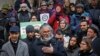FILE - Ravi Ragbir, center, a citizen of Trinidad and Tobago and executive director of the New Sanctuary Coalition of New York City, speaks during a press conference held on his behalf as he fights deportation, Jan. 31, 2018, at New York City Hall. 