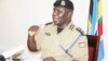 Ugandan police spokesman Fred Enanga addresses a news conference at Police headquarters in Kampala, April 8, 2019.
