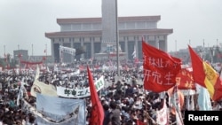 FILE - Hundreds of thousands of people, seeking political and economic reforms, crowded Beijing’s central Tiananmen Square May 17, 1989, in the biggest popular upheaval in China since the Cultural Revolution of the 1960s.