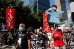 Protesters stage a rally outside Legislative Council as Hong Kong Chief Executive Carrie Lam delivers her speech in Hong Kong, Oct. 16, 2019.