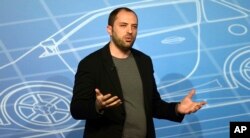 FILE - In this Feb. 24, 2014, photo, WhatsApp co-founder and CEO Jan Koum speaks during a conference at the Mobile World Congress in Barcelona, Spain.
