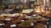 A shop in New Delhi sells almonds and walnuts, which are among the 29 U.S. products on which India has announced retaliatory tariffs starting August 4. India is the largest market for U.S. almonds. (A. Pasricha/VOA)