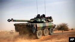 A French tank is seen heading north at the tail end of military convoy in Gao, February 6, 2013.