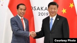 Presiden Joko Widodo dalam pertemuan dengan Presiden China Xi Jinping di sela KTT G20 di Osaka, Jepang hari Jumat (28/6). (Foto: Biro Setpres RI)