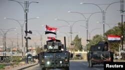Dakarun Iraqi suna shiga birnin Kirkuk