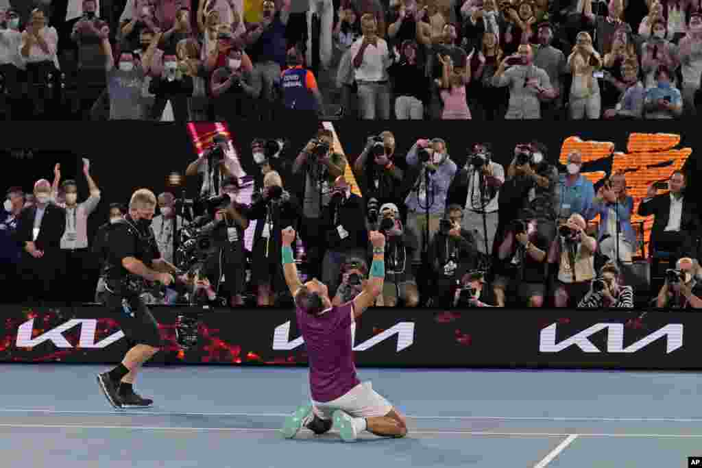 Rafael Nadal of Spain celebrates after defeating Daniil Medvedev of Russia during the men&#39;s singles final at the Australian Open tennis championships in Melbourne, Australia.