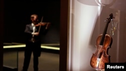 Violin that belonged to Titanic bandmaster Wallace Hartley on display at the Titanic Centre, Belfast, Sept. 18, 2013.