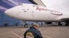 A Boeing employee attends the delivery of the final 747 jet at their plant in Everett, Washington, US Jan. 31, 2023. 