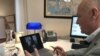 FILE - Martin Weiss, Ambassador of Austria to the U.S., is seen video conferencing in his office at the Embassy of Austria, March 27, 2020. (Courtesy: Austria Embassy)