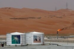 FILE - A production facility is seen at Saudi Aramco's Shaybah oilfield in the Empty Quarter, Saudi Arabia, May 22, 2018.