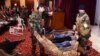 Iraqi students act out a scene in a play titled "We are all against terrorism" at Mansour Hotel in Baghdad, May 6, 2015. 