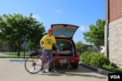 Ed Chasteen bikes at least 80 kilometers (50 miles) weekly, often to meet with victims of hate crimes in need of support. (VOA/R. Taylor)