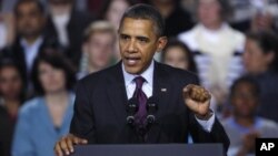 President Barack Obama delivering an address on the American Jobs Act, at Central High School in Manchester, New Hampshire, November 22, 2011.