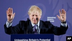 Perdana Menteri Inggris Boris Johnson memaparkan sikap pemerintah dalam negosiasi dengan Uni Eropa setelah Brexit, di Old Naval College, Greenwich, London, 3 Februari 2020. 