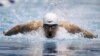 Michael Phelps competes in the 100-meter butterfly at the Indianapolis Grand Prix swimming meet in Indianapolis on March 29, 2012. 