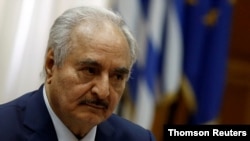 Libyan commander Khalifa Haftar said in a televised broadcast that resumption of oil production would involve a new committee to oversee revenue distribution. 