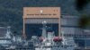 Myanmar vessels UMS Than Lwin (R) and UMS Sin Phyu Shin, which will be used to deport Myanmar migrants from Malaysia back to their homeland, are seen docked at a jetty in Lumut, outside Kuala Lumpur, Feb. 22, 2021. 