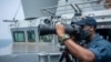 Kapal perusak berpeluru kendali USS "Curtis Wilbur" melakukan misi rutin di Selat Taiwan pada 18 Mei 2021. (foto: Angkatan Laut AS)
