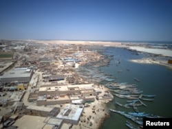An aerial view of fishing boats moored in Nouadhibou, Mauritania, April 15, 2018.