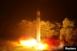 A Hwasong-14 intercontinental ballistic missile is pictured during its second test-fire in this undated picture provided by KCNA in Pyongyang, North Korea, on July 29, 2017.