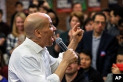 FILE - Sen. Cory Booker,D-N.J., speaks at a get-out-the-vote event hosted by the NH Young Democrats at the University of New Hampshire in Durham, New Hampshire, Oct. 28, 2018.