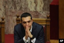 Greek Prime Minister Alexis Tsipras attends a parliamentary session in Athens, Jan. 16, 2019.