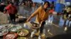 Amid Protests, China Enforces Tougher Sanctions Against North Korea