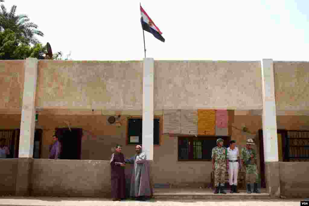 The village school in Kafr Qandil serves as the local polling station. (Y. Weeks/VOA)