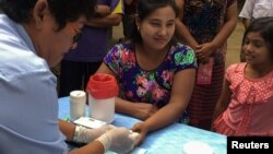 FILE - Juhudi za kukabiliana na malaria kwa kuboresha upimaji wa ugonjwa huo katika nchi ya Thailand, Novemba. 29, 2017.