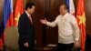 Philippines' President Benigno Aquino (R) prepares to shake hands with Vietnam's Prime Minister Nguyen Tan Dung during during their meeting at the Malacanang Presidential Palace in Manila, May 21, 2014.