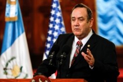 FILE - Guatemala's president, Alejandro Giammattei, speaks during a news conference in Guatemala City, Feb. 7, 2020.