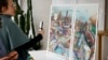 Sejumlah wartawan mengambil gambar dari poster Olimpiade dan Paralimpiade Paris 2024 di sebuah workshop di Ivry-sur-Seine, Paris, pada 20 Februari 2024. (Foto: AP/Thomas Padilla)