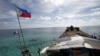 Philippines ‘to assert our rights’ after China sea deal 
