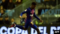 Ousmane Dembele contrôle le ballon lors du match contre le RC Celta de Vigo, Espagne le 4 janvier 2018.