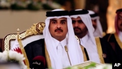 L'Émir du Qatar Sheikh Tamim bin Hamad Al-Thani lors d'une réunion à Doha, Qatar, le 9 décembre 2014.
