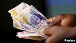 FILE - Nigerian naira banknotes are seen in this picture illustration, Sept. 10, 2018.