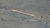In this image taken from YouTube footage released by Armenian Defense Ministry Sept. 13, 2022, shows Azerbaijani servicemen crossing the Armenian-Azerbaijani border and approaching Armenian positions.