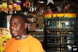 Emton Kalimanjira behind the bar at Kaapsche Hoop, South Africa...He enjoys meeting lots of "strange, but wonderful" people from all over the world here