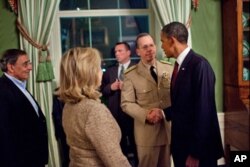 Le président Obama et l'amiral Mike Mullen, chef d'état-major interarmes, à la Maison-Blanche